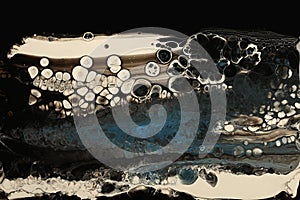 Abstract flow pour acrylic and watercolor wave marble blot painting. Beige and black Color marble texture background