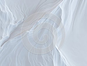 Abstract flowing white and pale blue fabric waves background texture