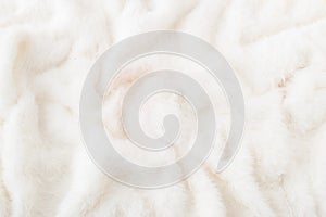 Abstract fluffy white fur texture background. Minimal warm winter concept