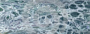 Abstract fluid art background gray colors. Liquid marble. Acrylic painting with grey gradient and splash