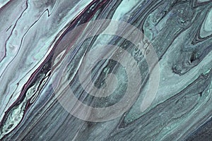 Abstract fluid art background gray and silver colors. Liquid marble. Acrylic painting with gradient and splash