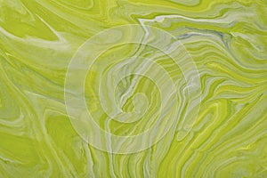 Abstract fluid art background green and gray colors. Liquid marble. Acrylic painting with olive gradient