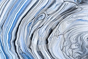 Abstract fluid art background light blue and gray colors. Liquid marble. Acrylic painting on canvas with gradient