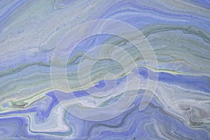 Abstract fluid art background light blue and gray colors. Liquid marble. Acrylic painting with gradient and splash