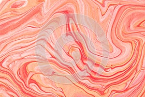 Abstract fluid art background red and pink glitter colors. Liquid marble. Acrylic painting with coral gradient