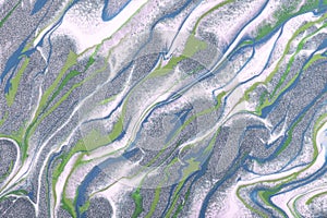 Abstract fluid art background silver, white and green colors. Acrylic painting o with blue lines and gradient
