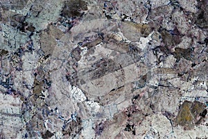 Abstract formed from a closeup of a polished stone surface