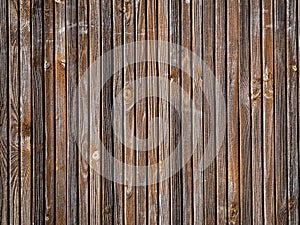 The abstract geometric background of narrow wooden aged slats