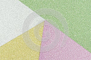 Abstract geometric glitter paper background in pastel colors.