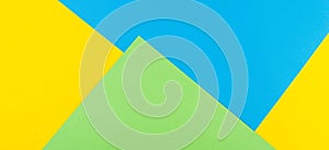 Abstract geometric paper background. Yellow, blue and green colors.