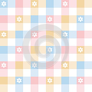 Abstract geometric pattern for spring summer with daisy flowers. Pastel colorful gingham tartan check plaid in blue, pink, yellow.