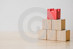 Abstract geometric real wooden cube with surreal layout on white background