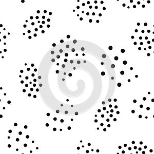 Abstract geometric seamless pattern with randomly scattered round dots. Drawn by hand.