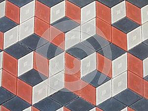 Abstract geometrical brick stone pavement black and red pattern