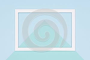 Abstract geometrical flat lay pastel blue and turquoise colored paper background. Minimalism, geometry and symmetry template.