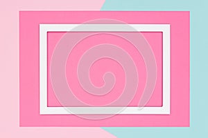 Abstract geometrical pastel blue, teal and pink paper flat lay background. Minimalism, geometry and symmetry template.