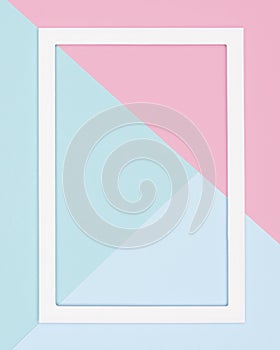 Abstract geometrical pastel blue, teal and pink paper flat lay background. Minimalism, geometry and symmetry template.