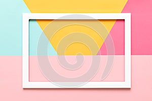 Abstract geometrical pastel blue, yellow and pink paper flat lay background. Minimalism, geometry and symmetry template.