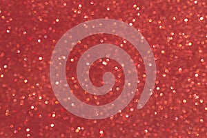 Sparkly glitter, red background bokeh effect photo
