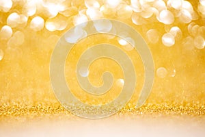Abstract glitter golden background with copy space