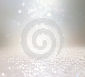 Abstract glitter silver and gild lights background. de-focused photo