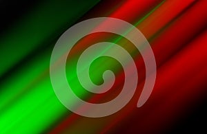 Abstract glowing red green on black motion blur background.