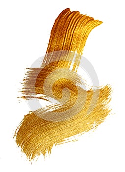 Abstract gold background with acrylic paint brush on white background