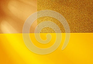 Abstract gold background, sunlight rays and sparkle of gold glitter texture background