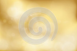 Abstract gold color background with bokeh light.