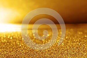 The abstract gold glitter lighting background
