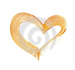 Abstract gold heart with acrylic paint brush on white background with place for your text