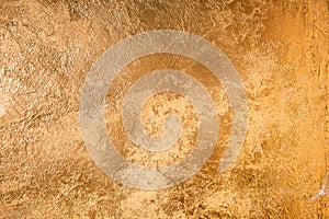 Abstract Gold Texture. Wall Colored With Golden Plaster