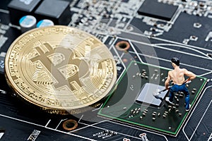 Golden Bitcoin money on computer.