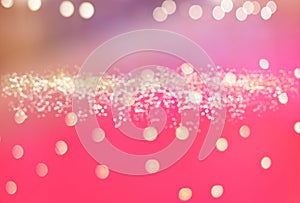 Abstract Golden Bokeh And Small Bokeh Line At Centre With Blurry Pink Gradient Background