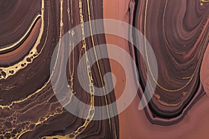 Abstract Golden curl on brown waves. Art Deco marbling background or texture. Acrylic Fluid Art