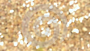 Abstract golden festive background with bokeh defocused lights. Video background