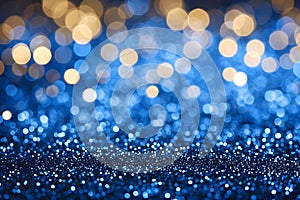 Abstract golden yellow and blue glitter lights background. Circle blurred bokeh