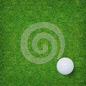 Abstract golf sport background of golf ball and golf hole on green grass background.