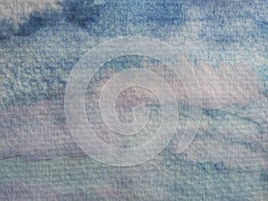 Abstract gradient blue and white sky with cloud background and copy space; Watercolor backdrop hand drawn painting on paper. -