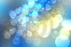 Abstract gradient of dark blue yellow turquoise pastel background texture with glowing circular bokeh lights. Beautiful colorful