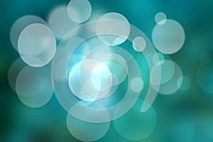 Abstract gradient green turquoise blue shiny blurred background texture with circular bokeh lights. Beautiful backdrop. Space for