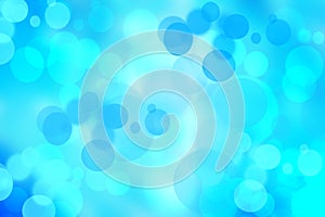 Abstract gradient of light blue turquoise dark blue white background texture with glowing circular bokeh lights. Beautiful