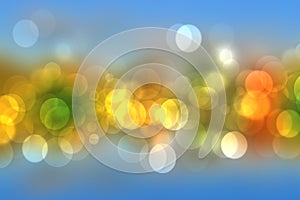 Abstract gradient of light blue yellow pastel background texture with glowing circular bokeh lights. Beautiful colorful spring or