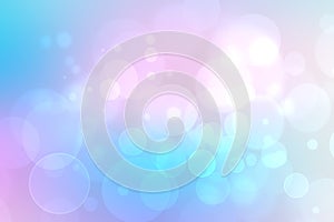 Abstract gradient of pink blue pastel light background texture with glowing circular bokeh lights. Beautiful colorful spring or