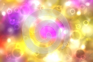 Abstract gradient purple pink yellow blue background texture with blurred bokeh circles and lights.  Beautiful colorful backdrop