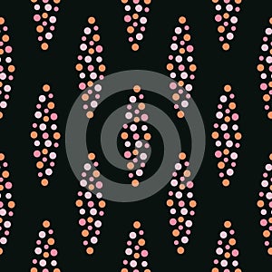 Abstract grape seamless texture. Polka dot shapes pattern ornament. Repeated circles seamless print in black and orange