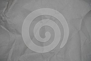 Abstract gray background of crumpled paper