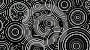 Abstract grayscale pattern featuring overlapping concentric circles background design