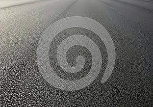 Abstract grayscale textured surface background with subtle light gradient pattern