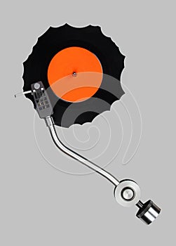 Abstract grazed vynil with record player tonearm